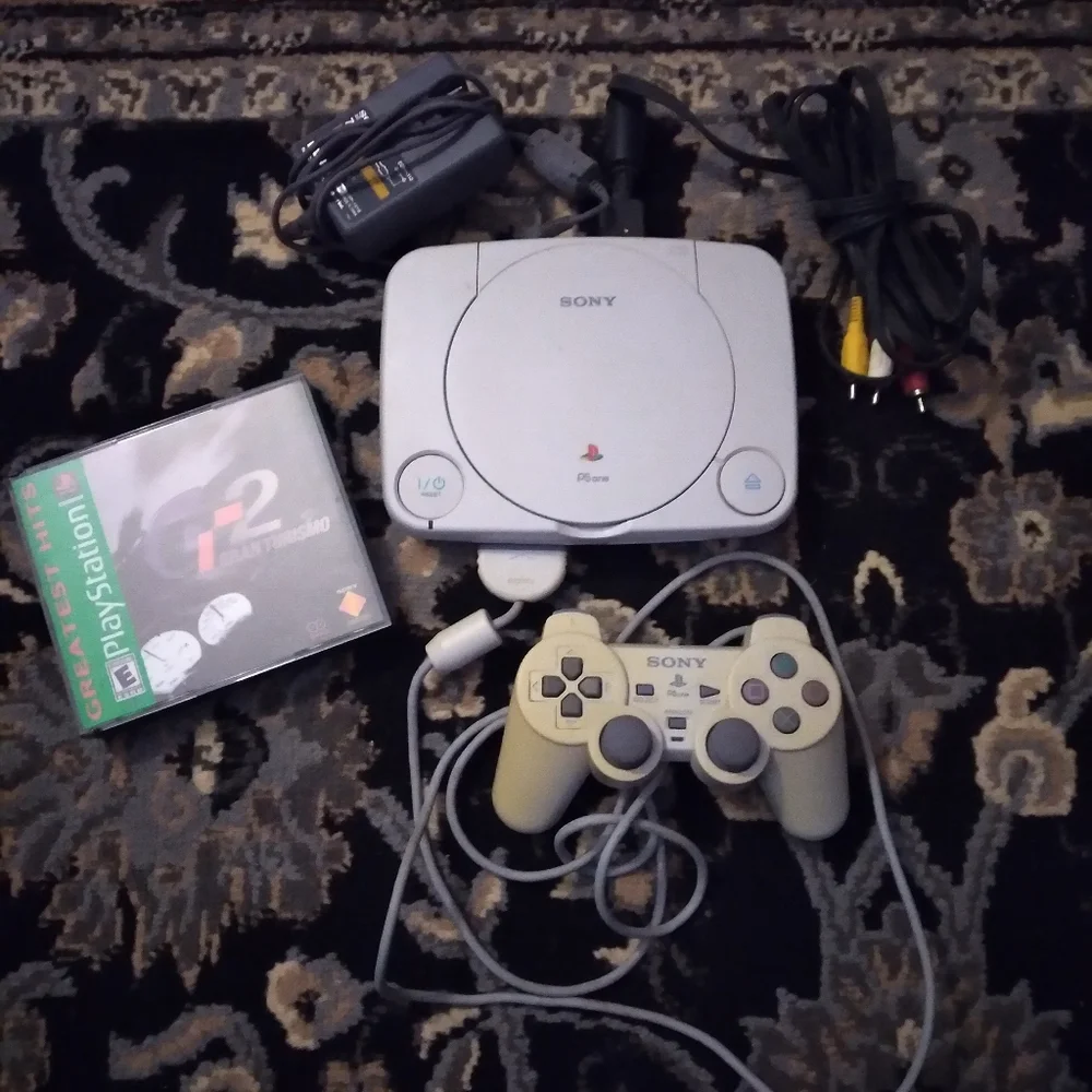 Sony PSone Mini Console with original controller and cables +FREE game
